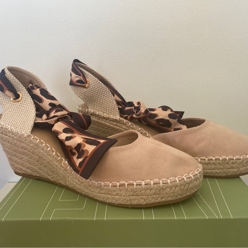 Wedge espadrilles with a leopard print ankle tie